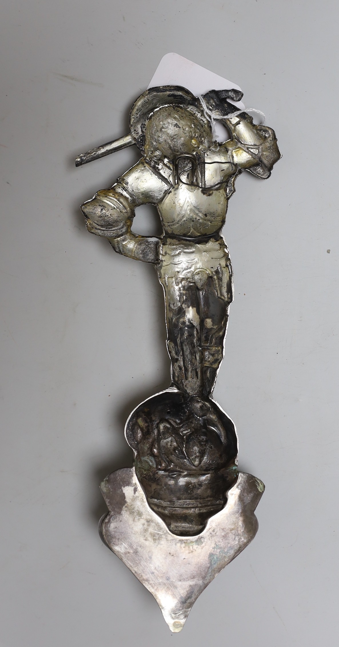 A continental white metal holy water stoop, 27cms high